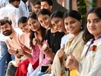 DUSU 2026 election LIVE: Students were seen posing for photographs as they waited in queues to cast their votes during the Delhi University Students' Union (DUSU) elections on Friday.