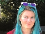 Emily Normandin-Parker (L) and Uber logo displayed on a smartphone screen.
