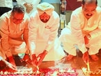 Punjab BJP president Kewal Singh Dhillon, party in-charge Satish Poonia and former state president Ashwani Sharma lighting diyas at the Pathankot railway station. (Videgrab)