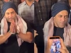 Salman Khan struggles to make way amid crowd frenzy.