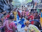 With no water in the taps close to their shanties, women and children fetch water from adjacent colonies, while water tankers are hired twice every week to supply water to the residents.