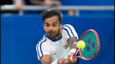India's Sumit Nagal returns the ball to South Korea's ​Hyeon Chung during a Davis Cup second round qualifier match in Seoul, South Korea on Friday. (AP Photo/Ahn Young-joon)