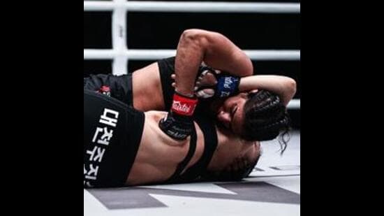 India’s Ritu Phogat (top) fights Nam Hee Kim of South Korea during the 2019 One Championship in Beijing. (Getty Images)