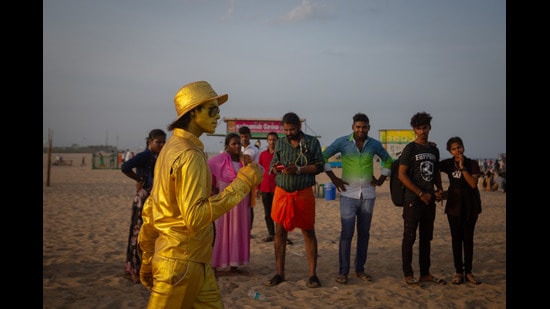 Mohan 'Golden Man' Babu, a living statue busker performing at Marina Beach, Chennai in September 2024 India. (Abhishek Chinnappa/Getty Images)