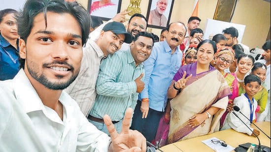 The team, with CM Rekha Gupta and minister Ashish Sood. (HT Photo)