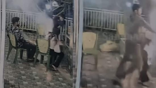 A video of the incident shows the couple sitting beside the barbecue before the situation suddenly escalates. (HT VIDEO GRAB)