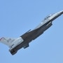 (FILES) A US Air Force F-16 Fighting Falcon performs a maneuver during the inaugural day of the Aero India 2019 airshow at the Yelahanka Air Force station in Bangalore, India on February 20, 2019. A US military F-16 fighter jet crashed on September 17, 2026 in the US state of Michigan, with the pilot able to eject safely. The aircraft belonged to the Texas Air National Guard and was on a training mission when the crash occurred, US media reported. (Photo by Manjunath KIRAN / AFP)