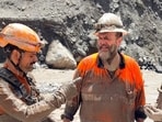Australian tunnel rescue expert Arnold Dix (C) and others during dewatering and slush removal activities by a joint technical team from India at the tunnel in Chilime, in Rasuwa on Wednesday. (MEA)