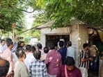 People gather as police inspect the site after Surendra Koli was found dead in Haridwar. People gather as police inspect the site after Surendra Koli was found dead in Haridwar.