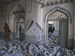 Army soldiers examine the site following a powerful bomb exploded at a mosque in Kohat, in northwestern Pakistan, Friday, Sept. 18, 2026. (AP/PTI)(AP09_18_2026_000389A)