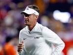Head coach Lane Kiffin of the LSU Tigers watches warm ups prior to a game against the Clemson Tigers at Tiger Stadium on September 5.