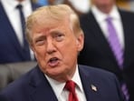 Eric Larson’s Trump pardon clears a major travel hurdle, giving Harris English’s longtime caddie another chance to work overseas again.. (AP Photo/Jacquelyn Martin)(AP Photo/Jacquelyn Martin)
