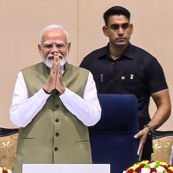 Prime Minister Narendra Modi greets the gathering during the inauguration of the International Conference on "The Future of Environment and Climate Dynamics", at Vigyan Bhawan, in New Delhi. 