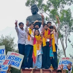 In this image posted on Sept. 19, 2026, Akhil Bharatiya Vidyarthi Parishad's (ABVP) Yash Dabas and others celebrate after winning three of the four central panel posts in the Delhi University Students' Union (DUSU) elections, at North Campus, in New Delhi.