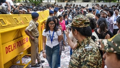 Students attending evening classes arrive to cast votes during the Delhi University Students Union (DUSU) elections, at Law Centre-I, Faculty of Law, in New Delhi. (PTI)