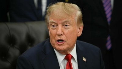 US President Trump signs H-1B order targeting employers over layoffs of US workers. (AFP) US President Trump signs H-1B order targeting employers over layoffs of US workers. (AFP)