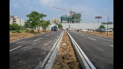The new road was constructed by Godrej Properties and is expected to improve local connectivity for residents and schoolchildren around Godrej Aristocrat. (Parveen Kumar/Hindustan Times) The new road was constructed by Godrej Properties and is expected to improve local connectivity for residents and schoolchildren around Godrej Aristocrat. (Parveen Kumar/Hindustan Times)