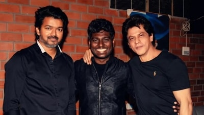 Atlee with Vijay and Shah Rukh Khan on his birthday in 2022. 