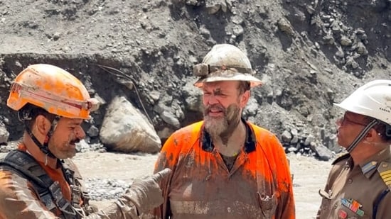 Australian tunnel rescue expert Arnold Dix (C) and others during dewatering and slush removal activities by a joint technical team from India at the tunnel in Chilime, in Rasuwa on Wednesday.