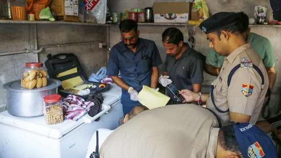 Police inspect the site after Surendra Koli was found dead in a tea stall opposite the Lal Mata Temple, in Haridwar on Friday.