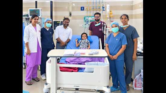 The child with the medical team treating him. (HT Photo)