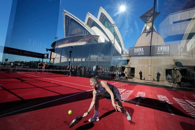 Spanish player Alejandra Salazar hits the ball on a padel court installed at the Sydney Opera House. (AP)