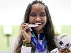 India’s Elavenil Valarivan with her silver medal after the women's 10m air rifle final in Aichi-Nagoya Asian Games on Sunday. (PTI)