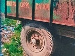 The municipal corporation vehicle that was spotted dumping waste near the school at Model Town Extension. (HT Photo)