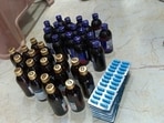The seized capsules and syrups. (HT Photo)
