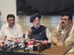 Union petroleum and natural gas minister Hardeep Singh Puri (C) with party leaders addresses a press conference, in Amritsar on Saturday. (Sameer Sehgal/HT)