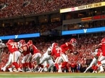 The NFL Players Choir is performing the anthem. (Photo by David Eulitt / GETTY IMAGES NORTH AMERICA / Getty Images via AFP)