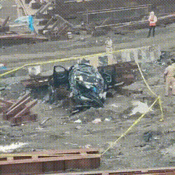 BMW mangled after speeding car falls from bridge in Mumbai.