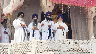 Akal Takht acting jathedar Giani Kuldeep Singh Gargaj along with clergymen pronouncing the decree from the platform of the highest Sikh temporal seat in Amritsar on Sunday. (Sameer Sehgal/HT) Akal Takht acting jathedar Giani Kuldeep Singh Gargaj along with clergymen pronouncing the decree from the platform of the highest Sikh temporal seat in Amritsar on Sunday. (Sameer Sehgal/HT)