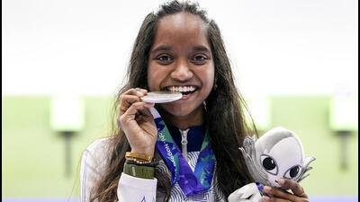 India’s Elavenil Valarivan with her silver medal after the women's 10m air rifle final in Aichi-Nagoya Asian Games on Sunday. (PTI) India’s Elavenil Valarivan with her silver medal after the women's 10m air rifle final in Aichi-Nagoya Asian Games on Sunday. (PTI)