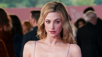 Lili Reinhart poses for photographers upon arrival at "The Love Hypothesis" premiere in London on Wednesday, Sept. 9, 2026. (Photo by Alberto Pezzali/Invision/AP) (AP Photo/Alberto Pezzali) Lili Reinhart poses for photographers upon arrival at "The Love Hypothesis" premiere in London on Wednesday, Sept. 9, 2026. (Photo by Alberto Pezzali/Invision/AP) (AP Photo/Alberto Pezzali)