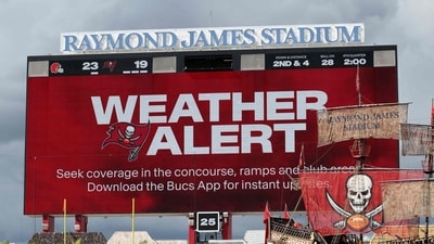 A weather alert is displayed in the Cleveland Browns game against the Tampa Bay Buccaneers during the second half at Raymond James Stadium in Tampa, Florida. (Getty Images via AFP)