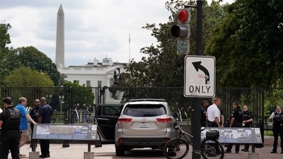 U.S. Secret Service Police stand near a car that sits parked on a sidewalk near the White House after the driver was arrested. (AP Photo/Jose Luis Magana) (AP Photo/Jose Luis Magana) U.S. Secret Service Police stand near a car that sits parked on a sidewalk near the White House after the driver was arrested. (AP Photo/Jose Luis Magana) (AP Photo/Jose Luis Magana)