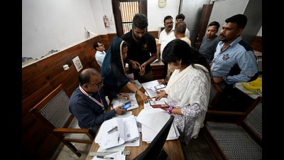 Voters arrive at a voter centre to seek clarification and make correction to their SIR forms. (Ishant Chauhan/HT Photo) Voters arrive at a voter centre to seek clarification and make correction to their SIR forms. (Ishant Chauhan/HT Photo)