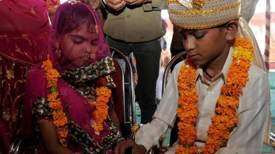 For several families in Vadia, which has a population of about 750, it is the only way of keeping their daughters away from the flesh trade that has long sustained the community. (AFP/Sam Panthaky)