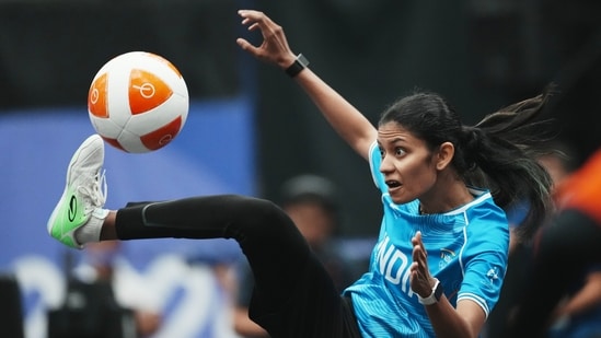 India's Quimcy Joaquim Dsouza kicks the ball during the women's singles bronze-medal teqball match against Japan's Yuina Sakamoto at the 20th Asian Games in Nagoya, Japan, Sept. 20, 2026. (AP/ PTI)
