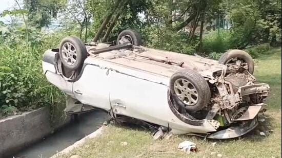 Police said efforts were underway to verify whether the victim was hit by the car during the crash early Saturday or he accidentally fell into that open drain. (HT Photo)