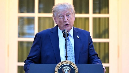 US President Donald Trump speaks during a Rose Garden dinner at the White House in Washington, DC.