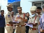 The cops reached the spot and took three people accused of throwing the packet into custody for questioning.