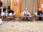 National Conference president Dr Farooq Abdullah and J&K CM Omar Abdullah preside over a meeting with party legislators in Srinagar on Sunday. (HT Photo)