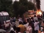 The driver fled the scene immediately after the crash, sparking intense anger among nearby locals and fellow pilgrims, who set the vehicle on fire. (Screengrab)