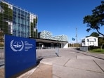 People stand outside the International Criminal Court in The Hague, Netherlands, September 22, 2025. 