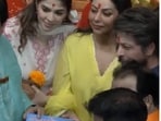 Shah Rukh Khan, along with his wife Gauri Khan and daughter Suhana Khan, offers prayers at the famous Lalbaugcha Raja pandal in Mumbai.