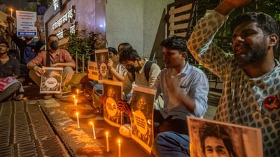 Students hold candles in memory of Sahil Wakode, a second-year IIT Bombay student who died by suicide, during a candlelight tribute at the university gate, Powai, Mumbai. (Satish Bate/Hindustan Times) Students hold candles in memory of Sahil Wakode, a second-year IIT Bombay student who died by suicide, during a candlelight tribute at the university gate, Powai, Mumbai. (Satish Bate/Hindustan Times)