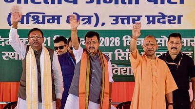 CM Yogi Adityanath, BJP national president Nitin Nabin and UP BJP chief Pankaj Chaudhary during the Shakti Kendra convenors’ conference (Western Region), in Meerut on Monday. (PTI PHOTO) CM Yogi Adityanath, BJP national president Nitin Nabin and UP BJP chief Pankaj Chaudhary during the Shakti Kendra convenors’ conference (Western Region), in Meerut on Monday. (PTI PHOTO)