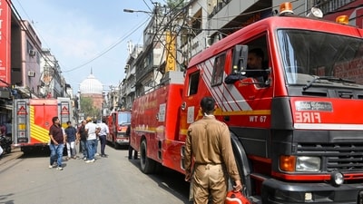 Delhi Fire Service personnel at Chawri Bazar near Jama Masjid, in New Delhi, on Tuesday, June 2 after a fire broke out at a shop and a godown (HT/ Sanjeev Verma)
